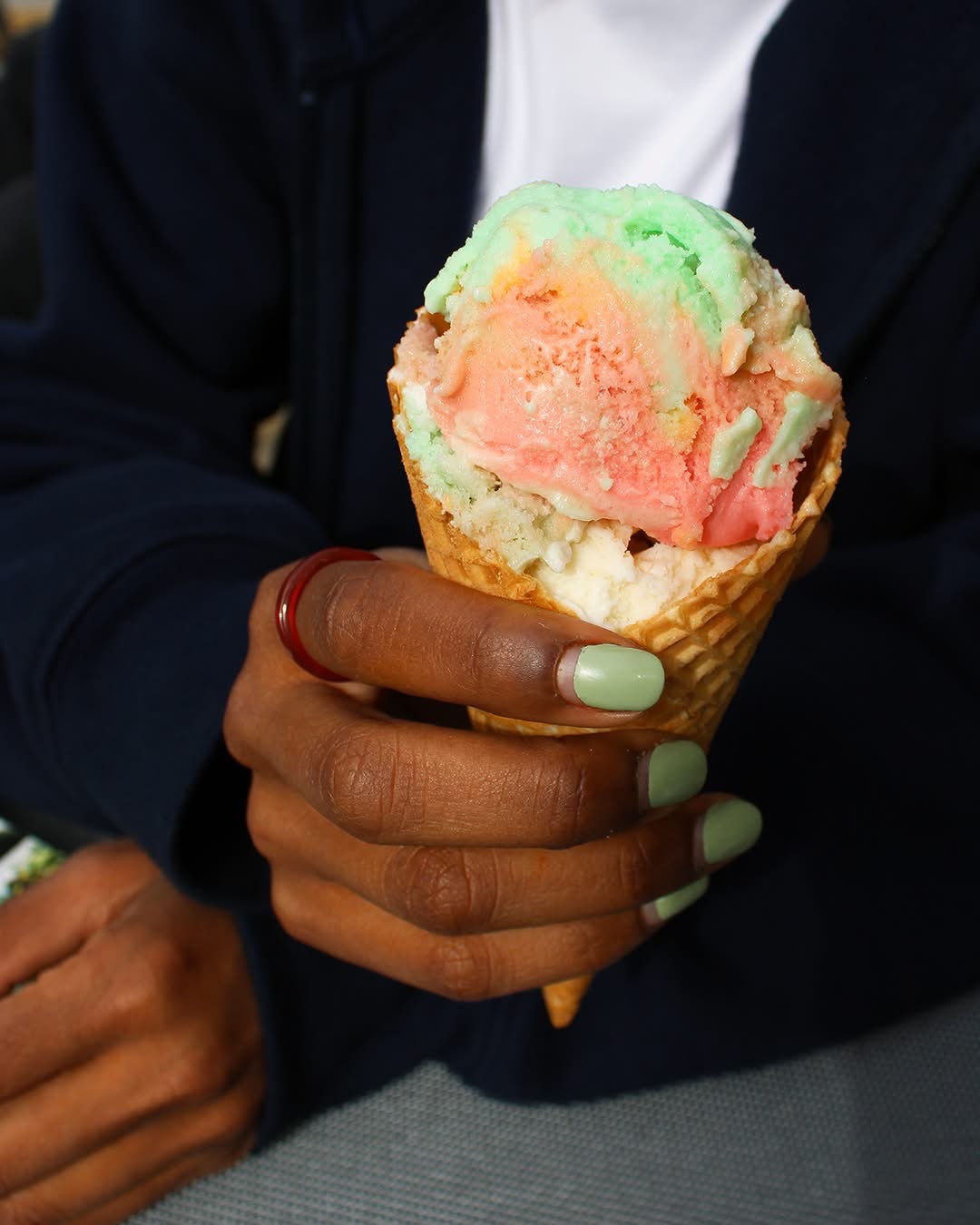Rainbow sherbet ice cream cone