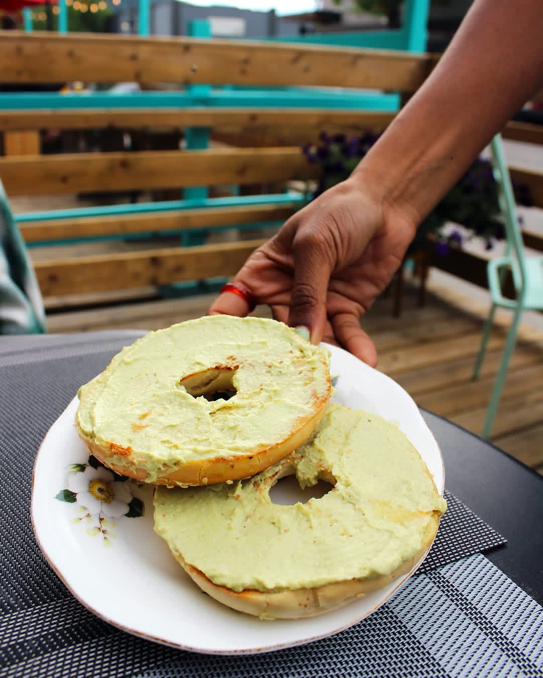 Avocado bagel on the patio